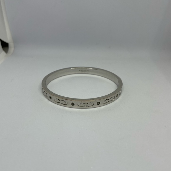 Coach Jewelry - Coach Kissing C Hinged Bangle Silver